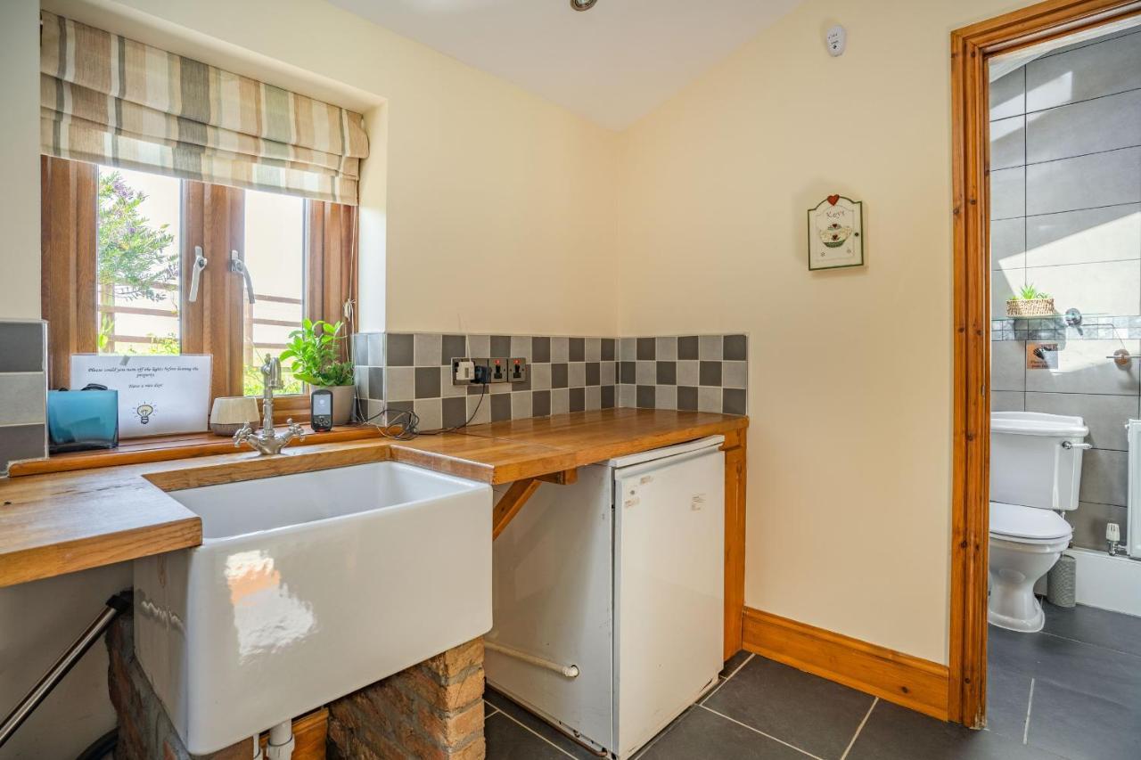 Ysgubor Hir Villa Llanedy Bagian luar foto